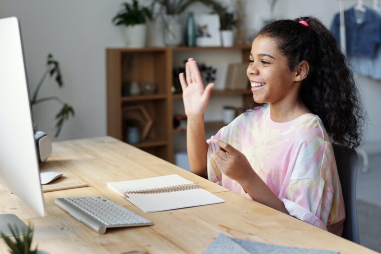 Girl with Hand Raised